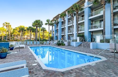 Gulf Place Apartment | Comfortable condo with kitchenette community pools & hot tub - walk to the beach