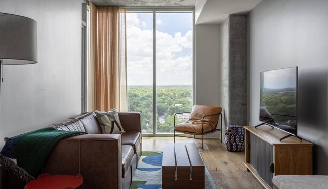 20th floor condo with pool on Rainey Street by Locale