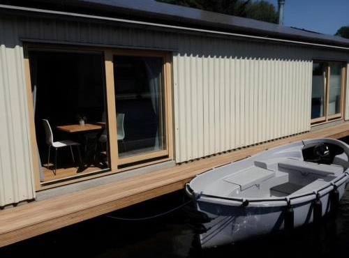 B&Boathouse Amsterdam with bikes and motorboat